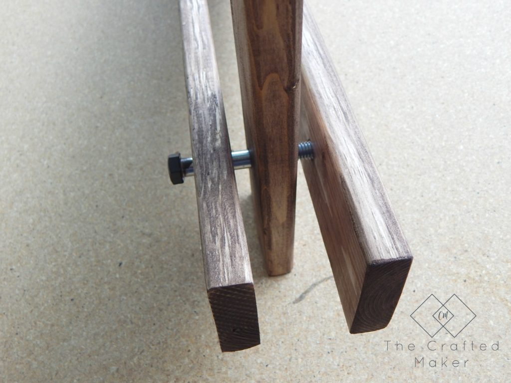 Build this DIY Arhaus inspired end table! Easy build with just a few sizes of wood and nuts and bolts. Great weekend project. Includes free PDF plans!